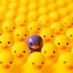 Concept image relating to standing out from the crowd, different, thinking outside the box, individuality, special, against the grain, etc.